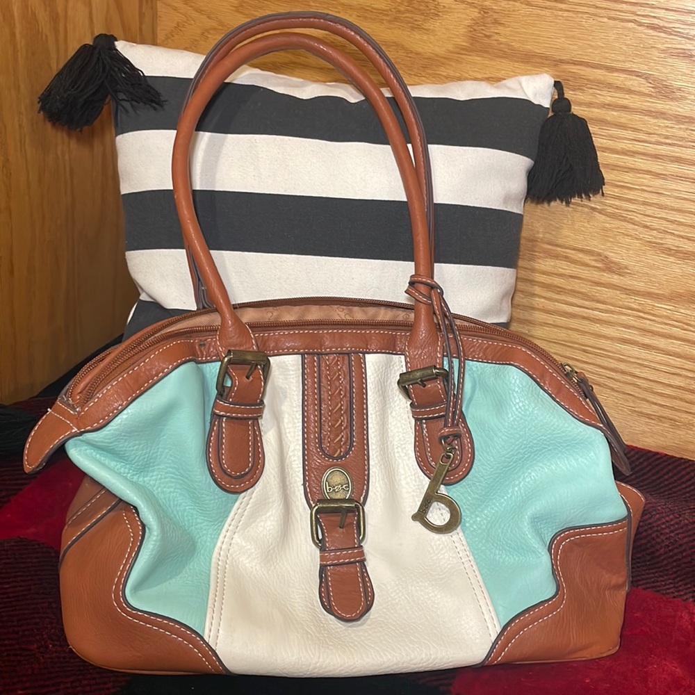 BORN BOC bag . Light teal and cream with tan leather straps .